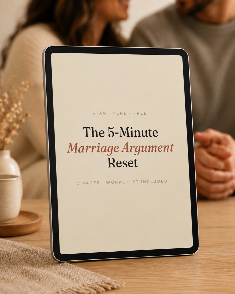 The 5-Minute Marriage Argument Reset shown on a tablet propped on a kitchen table, with a couple sitting together behind it.